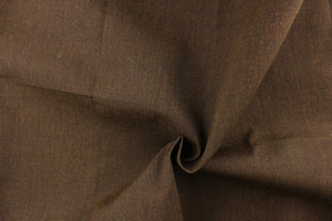 This fabric in a solid brown color with pinstripes is great for umbrellas, outdoor upholstery and more