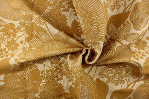This splendid Tapestry fabric features a textured golden yellow flowered design set against an off white background.  It would be a beautiful accent in any room in your home and can be used for bedding, accent pillows and drapery.  