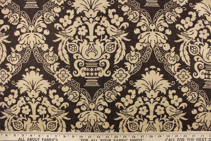  This ornate damask pattern features a small peacock with floral accents set against a brown background. It would be a beautiful enhancement in any room in your home and can be used for multi purpose upholstery, bedding, accent pillows and drapery.  Colors included are brown and khaki.