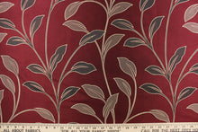 Load image into Gallery viewer, This magnificent Jacquard print features brown tropical leaves set against a  deep red background.  It has a slight sheen to enhance the look.  The pattern is woven into the fabric instead of stamped or printed.  The fabric is durable, strong and wrinkle resistant and has a structured feel.  It can be used for bedding, drapery, accent pillows, etc.
