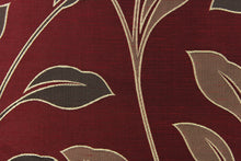 Load image into Gallery viewer, This magnificent Jacquard print features brown tropical leaves set against a deep red background. It has a slight sheen to enhance the look. The pattern is woven into the fabric instead of stamped or printed. The fabric is durable, strong and wrinkle resistant and has a structured feel. It can be used for bedding, drapery, accent pillows, etc.
