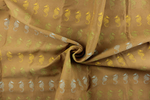 This indoor/outdoor beachy fabric features seahorses on a khaki background with a soil and stain resistant finish.  It is repellent of water and mildew.  Durable with 1,500 hours light fastness and exceeds 50,000 double rubs.  Use this for multi purpose upholstery, bedding, accent pillows and drapery.  Colors included are yellow, teal and green.