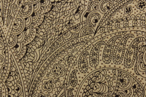 This firm brown paisley fabric is set against a tan background with a light acrylic backing.  It has a soil and stain repellant finish and is durable with 48,000 double rubs and would be a compliment to any room in your home.