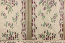 Load image into Gallery viewer, This beautiful fabric features a floral and stripe design set against a tan background.   It can be used for multi purpose upholstery, bedding, accent pillows and drapery.  Colors included are lavender, purple, taupe, tan and light green.
