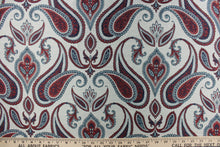 Load image into Gallery viewer, This beautiful tapestry fabric features a paisley print set on a light blue background.  It can be used for bedding, drapery and accent pillows.  It would be a great accent in any room in your home.  Colors included are red and blue.
