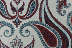 This beautiful tapestry fabric features a paisley print set on a light blue background.  It can be used for bedding, drapery and accent pillows.  It would be a great accent in any room in your home.  Colors included are red and blue.