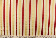 Load image into Gallery viewer, This luxurious silk striped fabric would be a beautiful accent to any room in your home. It can be used  bedding, accent pillows and drapery.  Colors included are gold and cranberry.
