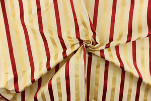 This luxurious silk striped fabric would be a beautiful accent to any room in your home. It can be used  bedding, accent pillows and drapery.  Colors included are gold and cranberry.