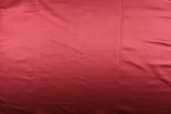  This elegant silk fabric in deep red has a lustrous look and can be used for multi purpose upholstery, bedding, accent pillows, drapery and apparel.