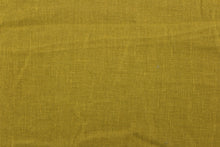Load image into Gallery viewer, This medium weight linen fabric in bronze is naturally absorbent and is perfect for jackets and other apparel. The fabric is also great for home decor such as window treatments, pillows, duvet covers, tote bags and more!

