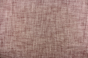 This cotton blend linen features a woven blend of the colors berry red and off white.  The fabric is great for home decor such as multi purpose upholstery, window treatments, pillows, duvet covers, tote bags and more! It is durable and exceeds 30,000 double rubs.