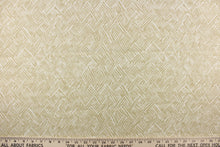 Load image into Gallery viewer, This fabric features a basket weave design in beige or taupe against a natural or off white background. 
