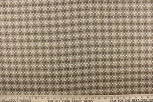 This fabric features a basket weave design in brown tones, gray and cream. 