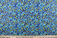 Load image into Gallery viewer, This quilting print features a beautiful floral design in varying shades of blue, yellow and white against a royal blue background
