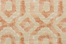 Load image into Gallery viewer,  This beautiful fabric features a geometric design in a peach, light khaki and a pale orange color with hints of white.
