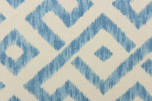 Load image into Gallery viewer,  This fabric features a geometric design in blue and natural or off white
