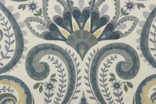 Load image into Gallery viewer, This fabric features a demask paisley design in shades of gray, green tones, hints of blue tones, and a pale gold against an off white or cream background. 
