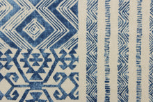 Load image into Gallery viewer,  This fabric features a geometric design in blue and natural or off white. 
