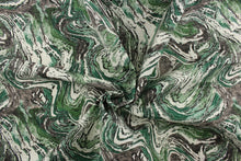 Load image into Gallery viewer, This decorative print fabric features a marble design set on a white background.  Uses include cushions, tablecloths, upholstery projects, decorative pillows and craft projects. This fabric has a slightly stiff feel but is easy to work with.  Colors included are black and green.

