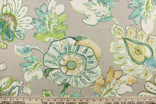 Load image into Gallery viewer,  This printed fabric features a floral design in colors of green, teal and gold on a gray background. 
