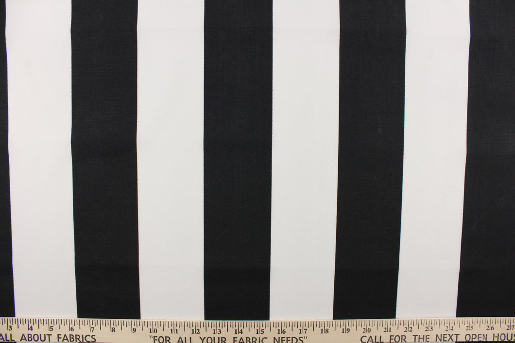 This indoor/outdoor fabric in black and white stripes is perfect for any project where the fabric will be exposed to the weather.  It is fade resistant and UV tested and can withstand 1000 hours of direct sunlight.  It is stain and water repellant and has a resistance to bleach, dirt and mildew.  Uses include cushions, tablecloths, upholstery projects, decorative pillows and craft projects. This fabric has a slightly stiff feel but is easy to work with. 