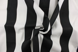 This indoor/outdoor fabric in black and white stripes is perfect for any project where the fabric will be exposed to the weather.  It is fade resistant and UV tested and can withstand 1000 hours of direct sunlight.  It is stain and water repellant and has a resistance to bleach, dirt and mildew.  Uses include cushions, tablecloths, upholstery projects, decorative pillows and craft projects. This fabric has a slightly stiff feel but is easy to work with. 