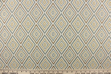 Load image into Gallery viewer, This fabric features a geometric design of diamonds in beige, sage green, brown and hints of light gray.
