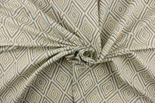 Load image into Gallery viewer, This fabric features a geometric design of diamonds in beige, sage green, brown and hints of light gray.
