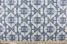 Load image into Gallery viewer, This geometric design in denim blue  and off white offer a modern look. 
