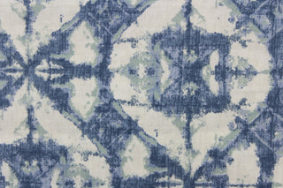This geometric design in denim blue  and off white offer a modern look. 