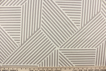 Load image into Gallery viewer, This fabric features a geometric design of stripes in gray and white. 
