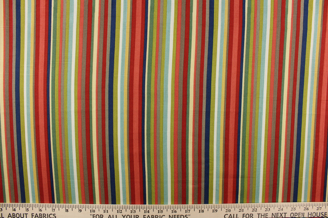 This vibrant fabric features a stripe design in red, taupe, white, khaki, peachy pink, yellow, green and  blue.