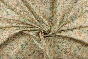 This fabric features a distressed paisley design in shades of brick red, blue green, hints of beige, yellow and off white. 