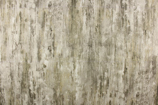 This fabric features a distress design in gray tones with hints of white and shades of brown. 
