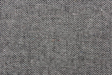 Load image into Gallery viewer, This wool blend fabric is great for transitioning into cooler weather.  It has a great hand and is hard-wearing.   The durability and wrinkle resistance make it perfect for suits, tailored garments, drapery and light duty upholstery fabrics. Colors included are gray and black.
