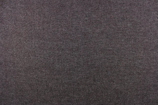 This wool blend fabric is great for transitioning into cooler weather.  It has a great hand and is hard-wearing.   The durability and wrinkle resistance make it perfect for suits, tailored garments, drapery and light duty upholstery fabrics. Colors included are dark purple and gray.