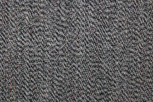 This black wool blend fabric is great for transitioning into cooler weather.  It has a great hand and is hard-wearing and perfect for suits, tailored garments, drapery and light duty upholstery fabrics. 