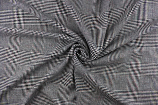 This duotone pattern wool blend fabric is great for transitioning into cooler weather.  It has a great hand and is hard-wearing.   The durability and wrinkle resistance make it perfect for suits, tailored garments, drapery and light duty upholstery fabrics. Colors included are black and white and red.