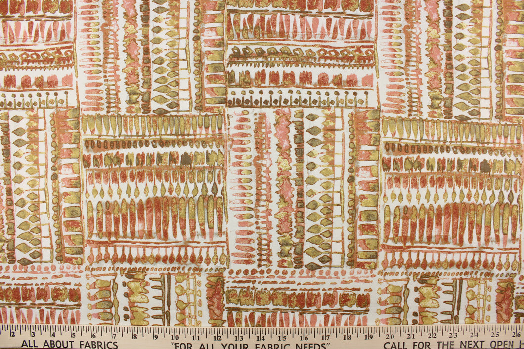 This fabric features an abstract design in washout reds, washout green tone, and white.