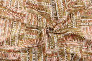 This fabric features an abstract design in washout reds, washout green tone, and white.