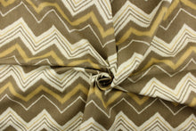Load image into Gallery viewer,  This fabric features a chevron design in varying taupe, khaki and off white. 
