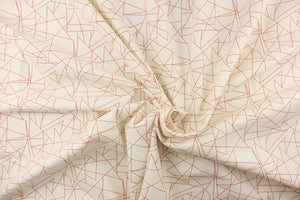 This fabric features a geometric design in a red orange color against a white background. 
