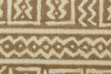 Load image into Gallery viewer, This fabric features a Aztec design in off white against a taupe background. 
