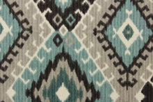 Load image into Gallery viewer,  This fabric features a geometric design of diamonds in varying shades of teal, and gray with hints of black and white
