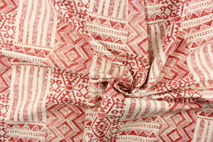 This fabric features an Aztec design in red and cream. 