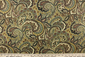 This fabric features a paisley design in varying shades of brown, khaki, cream, black and shades of green. 