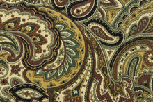 Load image into Gallery viewer, This fabric features a paisley design in varying shades of brown, khaki, cream, black and shades of green. 
