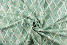 Load image into Gallery viewer, This fabric features a geometric diamond design in a blue green and dull white.
