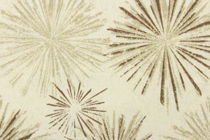  This fabric features a firework like design in tones of brown, khaki against a off white background. 