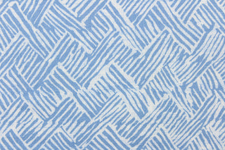 This fabric features a basket weave design in light blue jean blue and white.